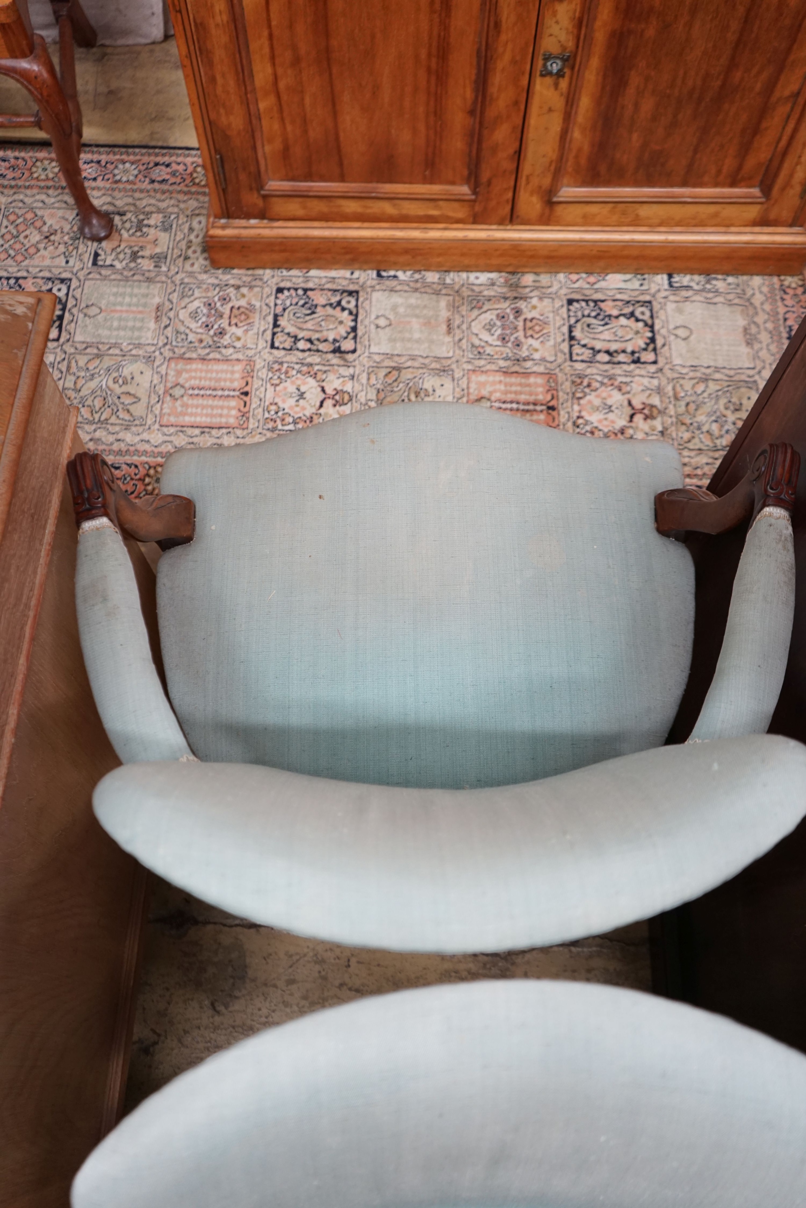 A pair of French Hepplewhite style mahogany open elbow chairs, width 65cm, depth 52cm, height 88cm